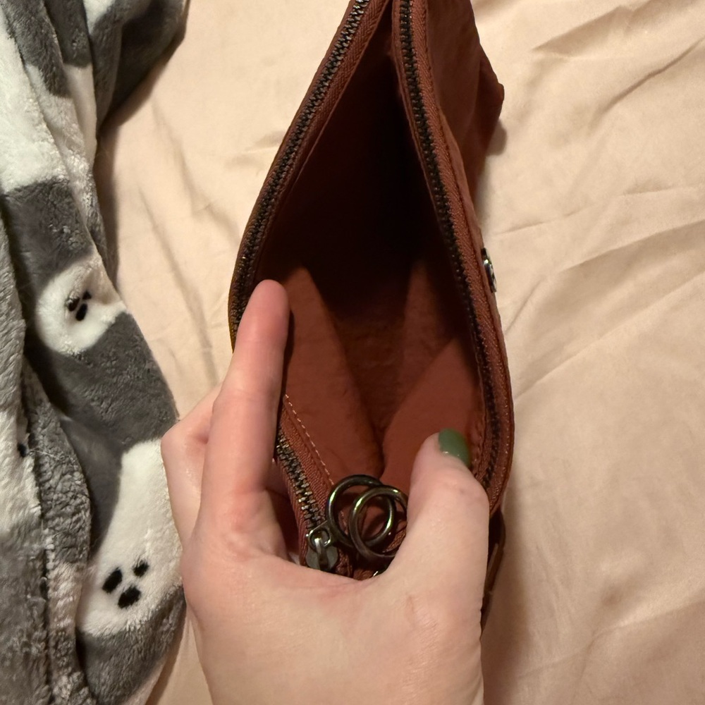 Lululemon Athletica orange/rust wristlet - Picture 2 of 4